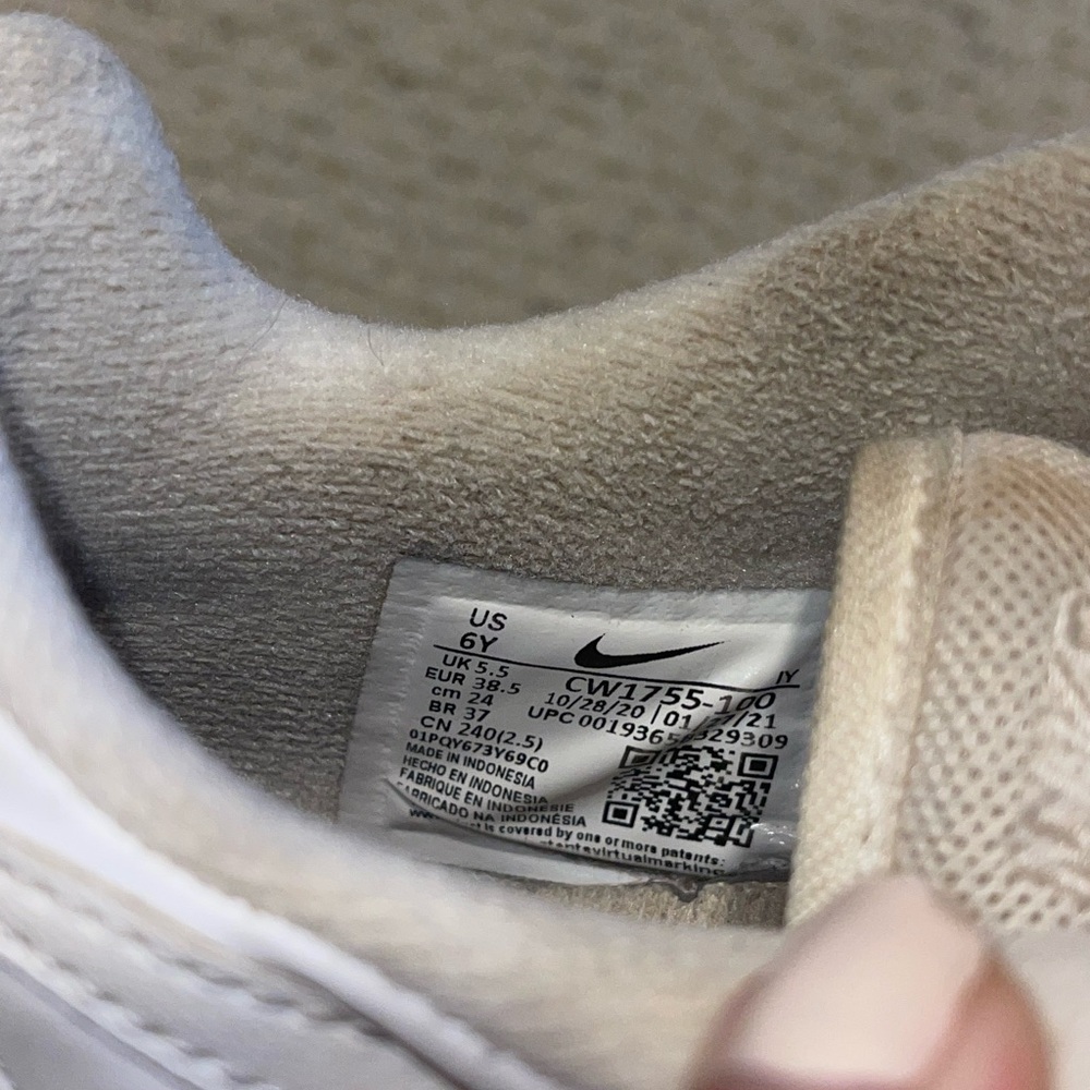 Well worn Nike sneakers